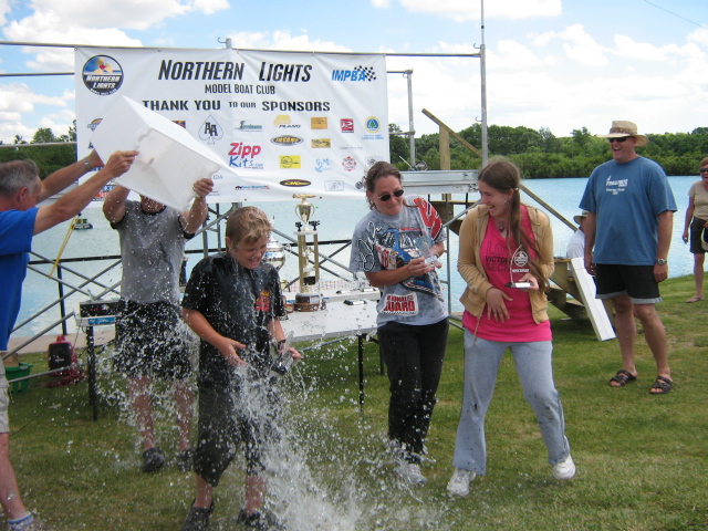 Novice, soon to be “Young Gun”, Dylan Kish gets doused for his first trophy.
